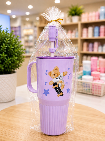 Purple tumbler mug with skateboarding bear, gift wrapped